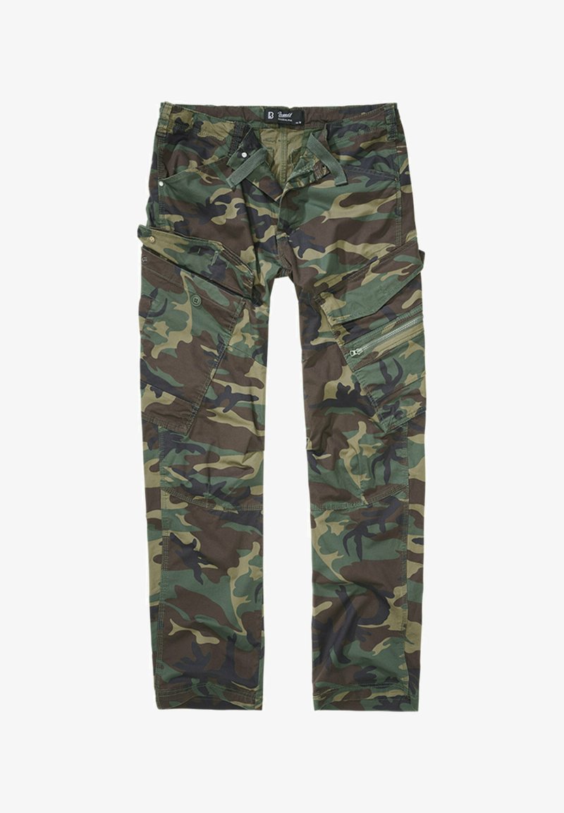 Kareivinės kelnės žaliame kamufliažo rašte. Pagamintos iš patvarios medžiagos, turi daugybę užtrauktukų ir kišenių su užsegimais, siaurėjančios kojos ir sustiprinti siūlai.