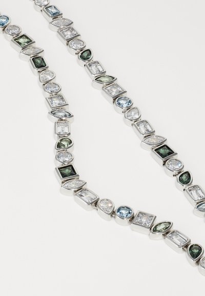 Silver necklace featuring alternating rectangular and oval gemstones in green, blue, and clear colors, set in polished metal.