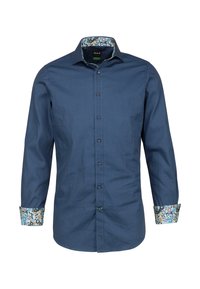 Camicia blu con bottoni, decorata con pois bianchi, polsini e colletto a fiori in contrasto, maniche lunghe e silhouette dritta.