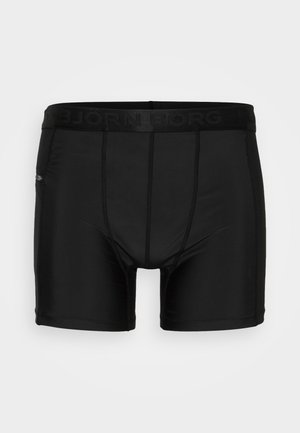 Boxer neri con una morbida cintura elastica che presenta il marchio "BJORN BORG". Tessuto liscio, design aderente e cuciture piane.