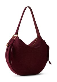 Burgundy leather bag with a smooth, textured surface, a curved shape, a zipper closure, and gold hardware accents. Adjustable shoulder strap included.