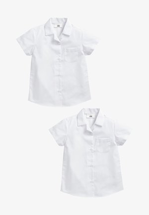 Cămașă albă cu mâneci scurte, cu guler, buzunar simplu pe piept și tiv curbat. Țesătură netedă din bumbac. Design minimalist.