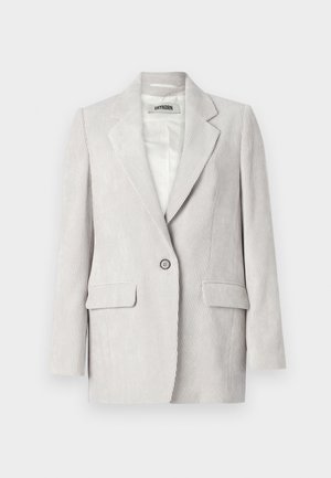 Lichtgrijze ribfluwelen blazer met een geknipte revers, enkele knopen sluiting, twee voorkruiszakken en een soepele binnenvoering.