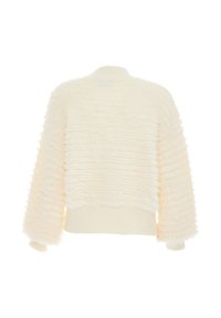 Maglione in pelliccia sintetica color crema con superficie testurizzata e ondulata, scollo rotondo e polsini e orlo a coste. Vestibilità comoda con spalle scese.