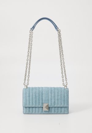 Light blue quilted handbag with a silver chain strap and a rectangular metallic closure. Textured fabric with horizontal stitching.