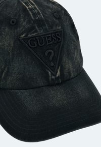 Guess Nokkmüts - schwarz