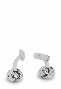 Gemelli da polso in argento con un design annodato e finitura liscia. Logo "BOSS" inciso sulla parte superiore piatta con aspetto metallico lucido.