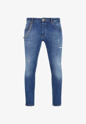 Tanke modre kavbojke z verigo, z blago obrabljenim videzom in klasičnim pet-pocket dizajnom. Trajna tkanina z gladko teksturo.