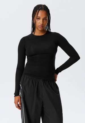 FITTED - Topper langermet - black