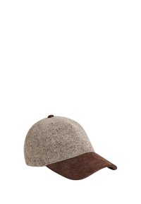 Cap made of textured light brown fabric with a darker brown suede visor and top button. Features a classic curved brim design.