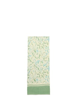 Rektangulært tørklæde med grønne og blå abstrakte bladmotiver og en ensfarvet grøn kant på en cremefarvet baggrund.