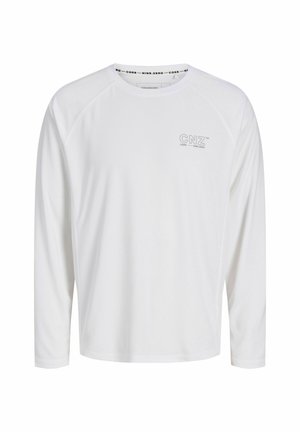 Valge pikkade varrukatega särk, mis on valmistatud kergest kangast. Omab raglan varrukaid ja väikest trükitud logist rinnal. Ühtlane tekstuur.