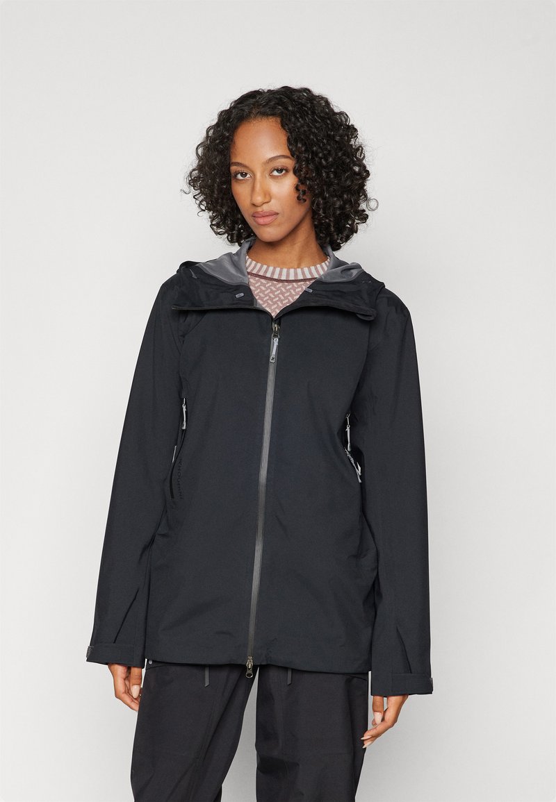 Black waterproof jacket with a hood, front zipper, and zipped side pockets. Features a gray interior lining and loose-fitting cuffs.