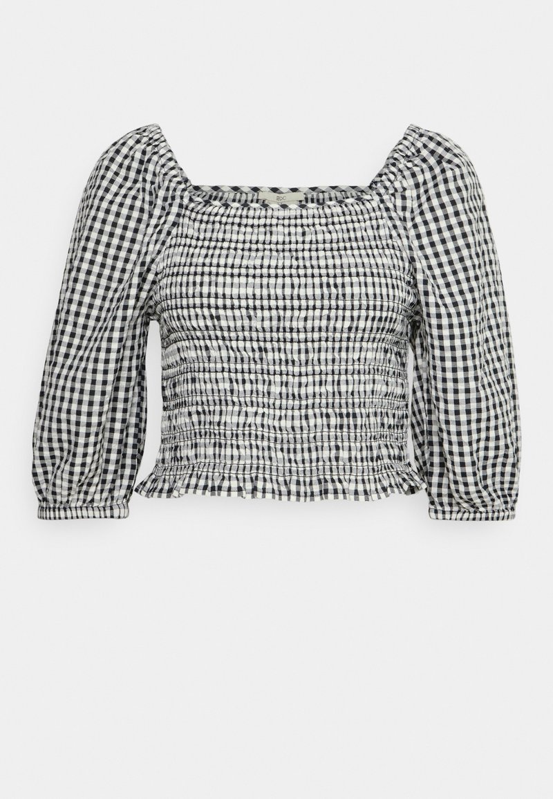 Black and white checkered top with a square neckline, smocked bodice, and puffed sleeves. Textured fabric with ruffled hem detail.