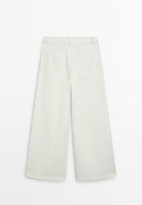 White wide-leg pants with belt loops and back pockets, displayed flat against a white background.