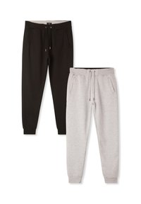 Dwie pary spodni dresowych: jedna czarna, druga jasnoszara. Obie mają elastyczne mankiety, sznurki w pasie oraz boczne kieszenie.