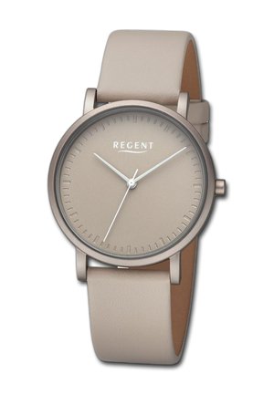 Montre avec bracelet en cuir beige, cadran rond brun clair, repères simples pour les heures, et fines aiguilles blanches pour les heures et les minutes ; nom de la marque affiché.