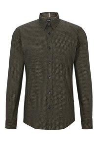 Camicia con bottoni in verde scuro con motivo geometrico. Presenta un colletto a punta, maniche lunghe e bottoni neri. Tessuto dalla consistenza morbida.