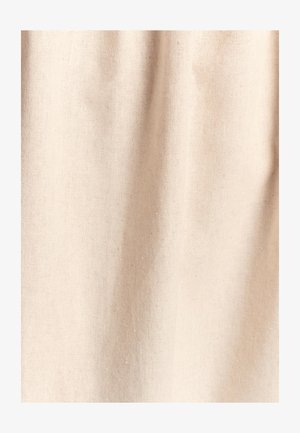 Beige cotton fabric with a textured weave, featuring a soft, slightly rough surface and subtle variations in tone throughout.