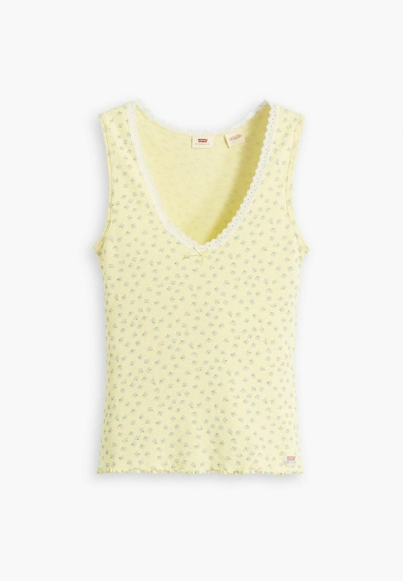 Top amarillo de tirantes con un escote en V profundo, estampado floral, encaje en el borde del escote y un dobladillo ligeramente rizado. Material de algodón suave.