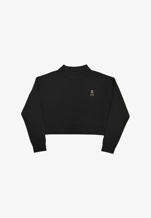Maglione nero corto con collo alto a costine, polsini e orlo a costine, con un piccolo logo dorato sul petto. Texture lavorata a maglia, maniche lunghe.