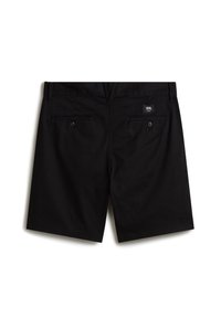 Short noir sur mesure vu de dos avec deux poches boutonnées et une petite étiquette logo Vans au-dessus de la poche droite.