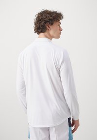 ASICS MATCH LS 1/2 ZIP - Sports T-shirts - brilliant white