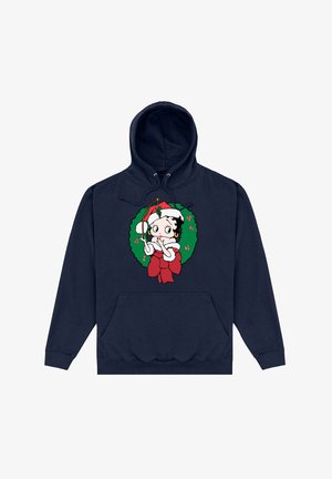 Hoodie bleu marine avec un motif d'un personnage de dessin animé portant un chapeau de Noël, entouré d'une couronne verte avec des accents rouges et un nœud.
