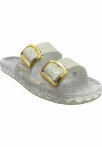 Sandali bianchi con doppie cinghie regolabili dotate di fibbie dorate, soletta testurizzata e suola traslucida. Progettati per comfort e stile.