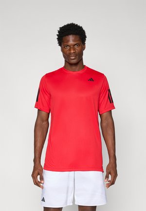 Red athletic short-sleeve shirt with black logo accents. Smooth texture, round neckline, and lightweight design suitable for sports activities.
