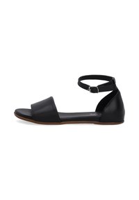 Schwarze flache Sandalen mit minimalistischem Design. Sie verfügen über einen Knöchelriemen, eine offene Zehenpartie und sind aus glattem Leder gefertigt. Gummisohle mit leichter Struktur.