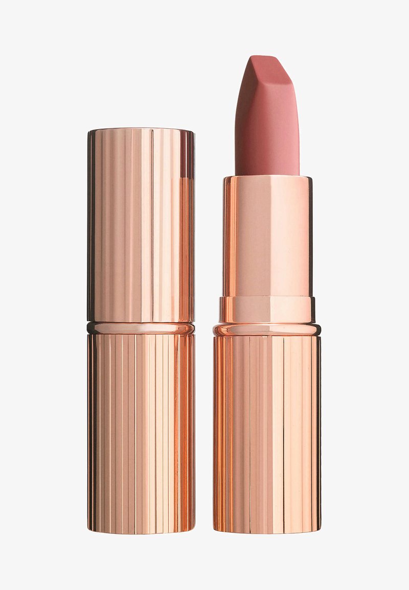 Lipstick in a sleek, ribbed rose gold case; bullet has a square tip with a soft pink color and smooth texture.