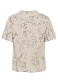 Beige košile s krátkým rukávem s ručně kreslenými obličeji a květinovými vzory. Lehká látka s uvolněným, boxy střihem a detailem na zadním díle.