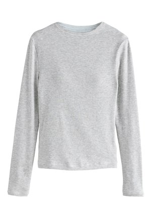 Chemise en tricot côtelé gris clair à manches longues avec col rond, présentée sur un fond blanc uni.