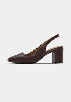 Brown leather slingback shoe with a pointed toe and chunky block heel. Features a side cutout and a smooth, glossy texture.