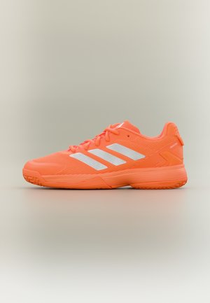 UBERSONIC UNISEX - Multicourt tennis shoes - footwear white/core black/lucid orange