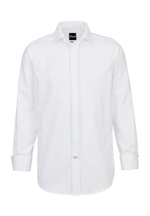 Camicia bianca a maniche lunghe in cotone con colletto strutturato, design semplice e chiusura frontale con bottoni. I polsini hanno dettagli con bottoni.