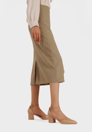 Klassieke pumps - nude