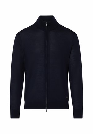 Jersey negro con cremallera completa, cuello alto, mangas largas y puños acanalados, mostrado sobre un fondo blanco liso.