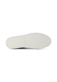 Vit gummisula med zigzag-mönster och TOMS-logotyp. Slät yta, rundad form, utformad för komfort och grepp.