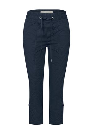 Navy cropped pants made from lightweight fabric, featuring an elastic waistband, adjustable drawstring, and zippered hem details.