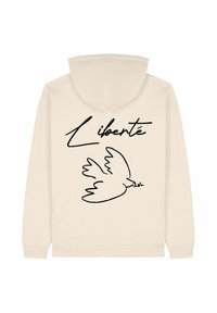 Felpa beige con un contorno nero di una colomba che tiene un rametto d'ulivo e la parola "Liberté" in un font scritto a mano sul retro.