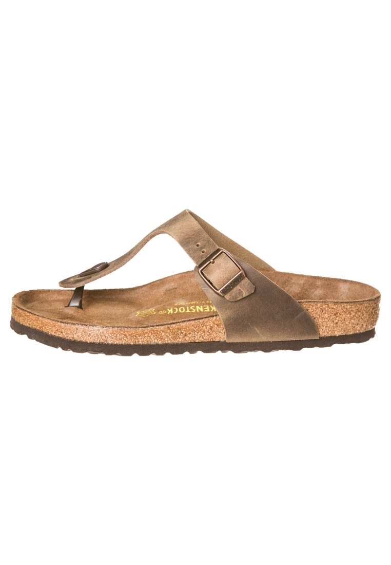 Brune læder flip-flop sandal med en bred rem og spænde detalje. Kork fodseng med struktureret gummisål for greb.