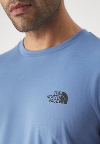 The North Face M SS SIMPLE DOME TEE - Tekninen t-paita - indigo stone