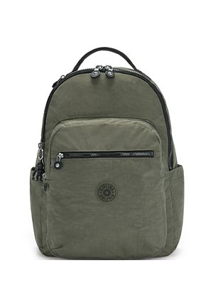 Olive green nylon backpack with two zippered compartments, a circular logo patch, and side pockets. Features black zipper accents and handles.