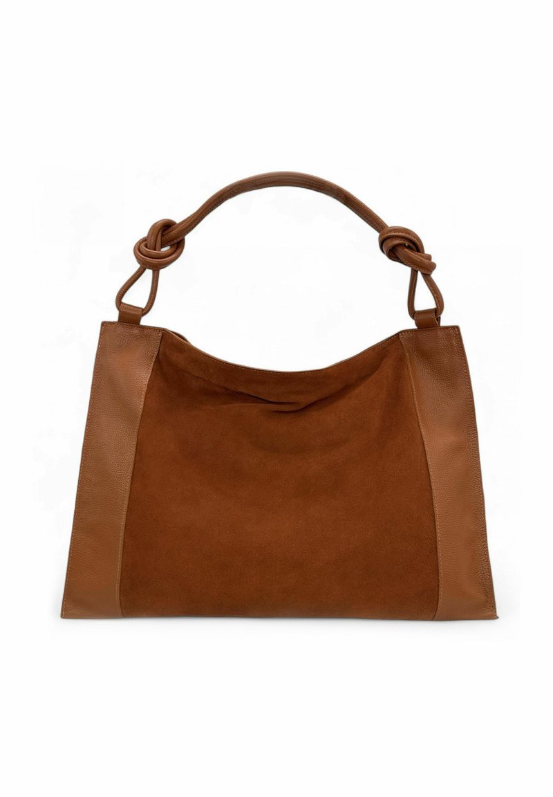 Sac en cuir et suède marron avec une poignée nouée et un corps rectangulaire, présenté sur un fond blanc.