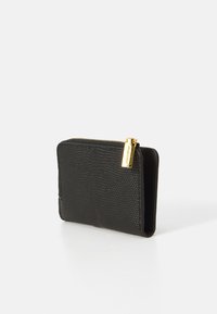 Black leather wallet with a textured finish, rectangular shape, gold zipper hardware, and top zip closure for secure storage.