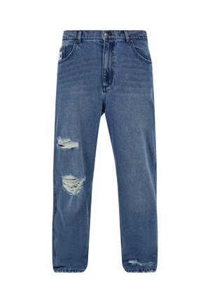 Heledad sinise värvi teksapüksid, millel on lahtine lõige, kulumistunnused ja rebenenud põlved, ning klassikaline viie taskuga disain.