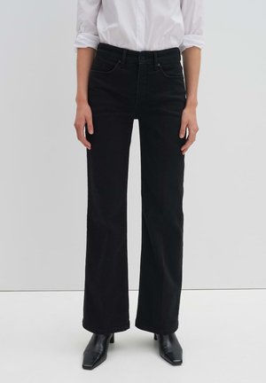 CARIE ICONIC - Flared Jeans - midnight black