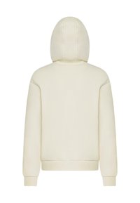 Cremfarbener Kapuzenpullover mit lockerer Passform, gerippten Bündchen und Saum. Glatte Textur mit sichtbaren Nähten und ohne Muster oder Verzierungen.